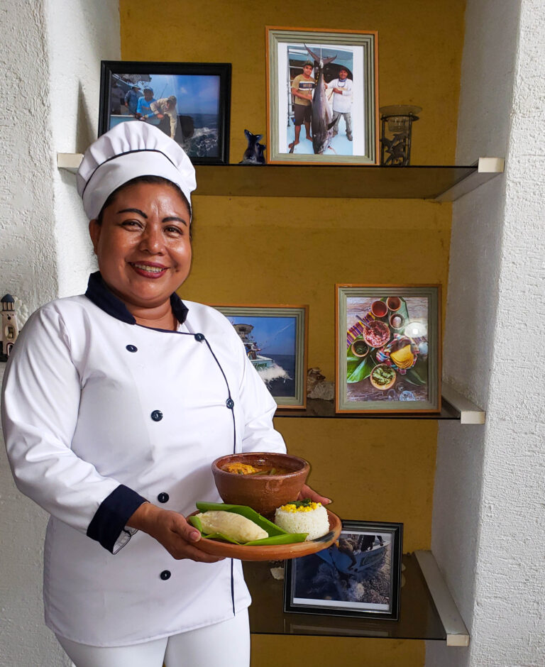 Captain Hook Chef Alejandra with traditional plate